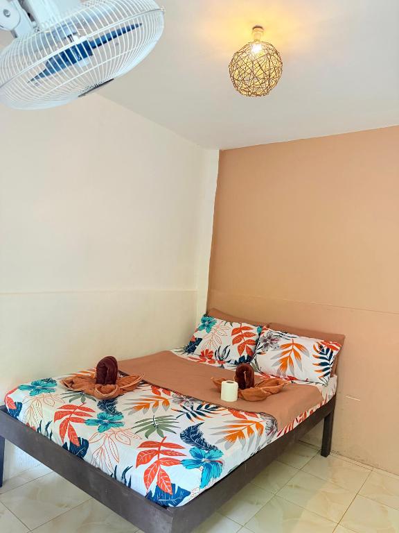 Postel nebo postele na pokoji v ubytování Paradiso Hostel El nido