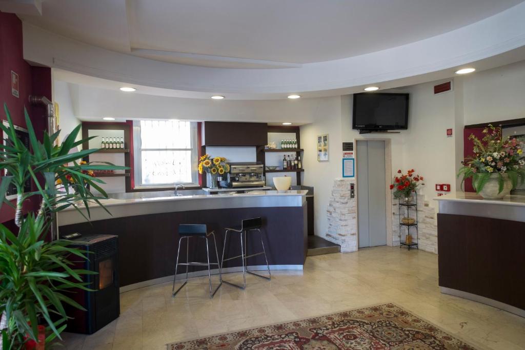 Kuchyň nebo kuchyňský kout v ubytování Hotel Crosal
