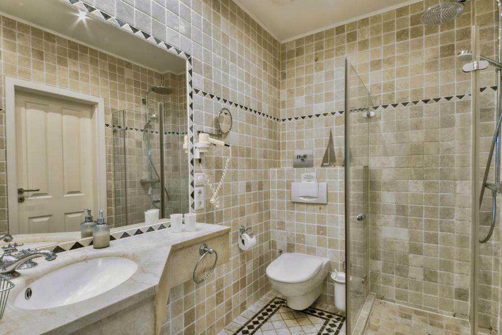 Koupelna v ubytování Ferienwohnung "Sonnendeck" in der Villa Seeadler Binz