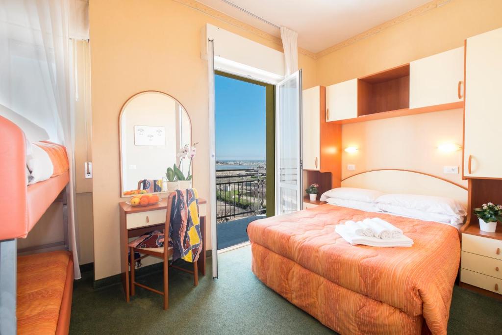 Postel nebo postele na pokoji v ubytování Hotel Crosal
