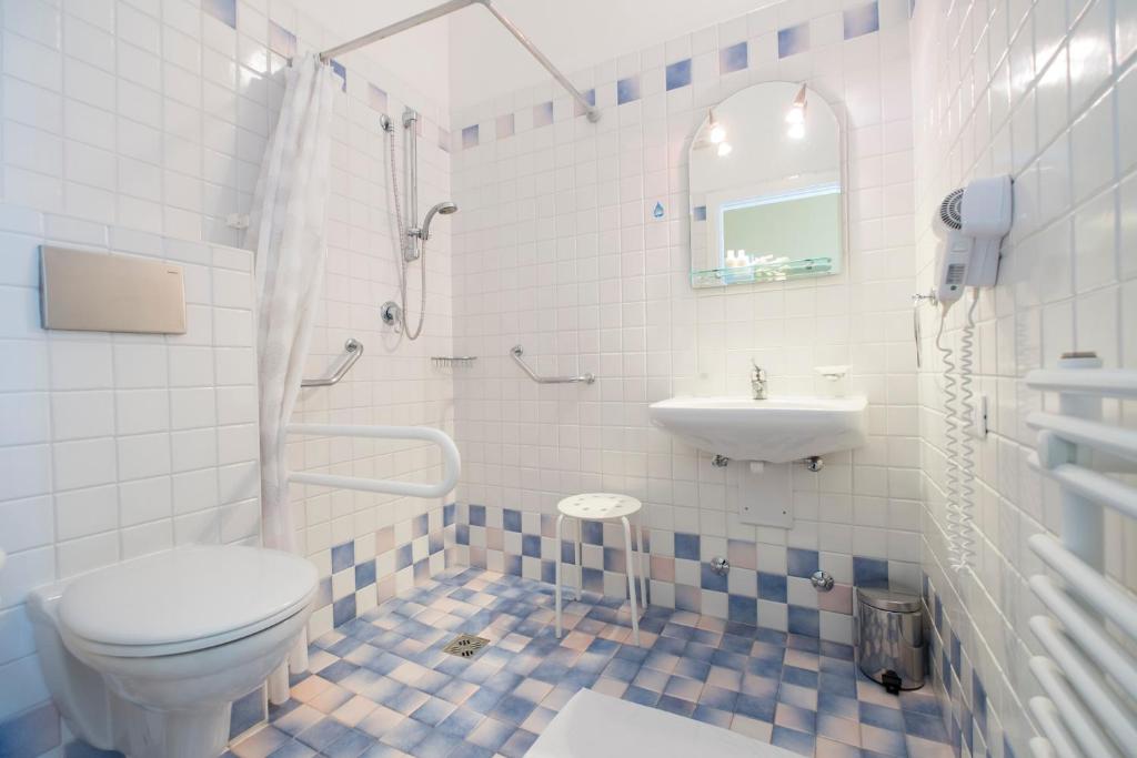 Koupelna v ubytování Hotel Crosal