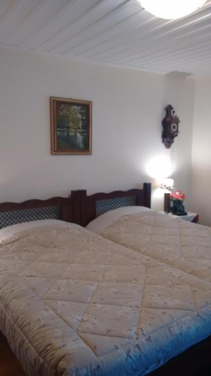 Postel nebo postele na pokoji v ubytování Alexandros Pension
