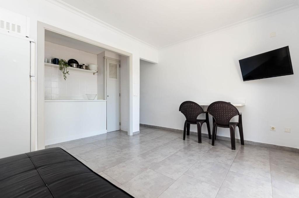 TV a/nebo společenská místnost v ubytování Alcudia Apartments