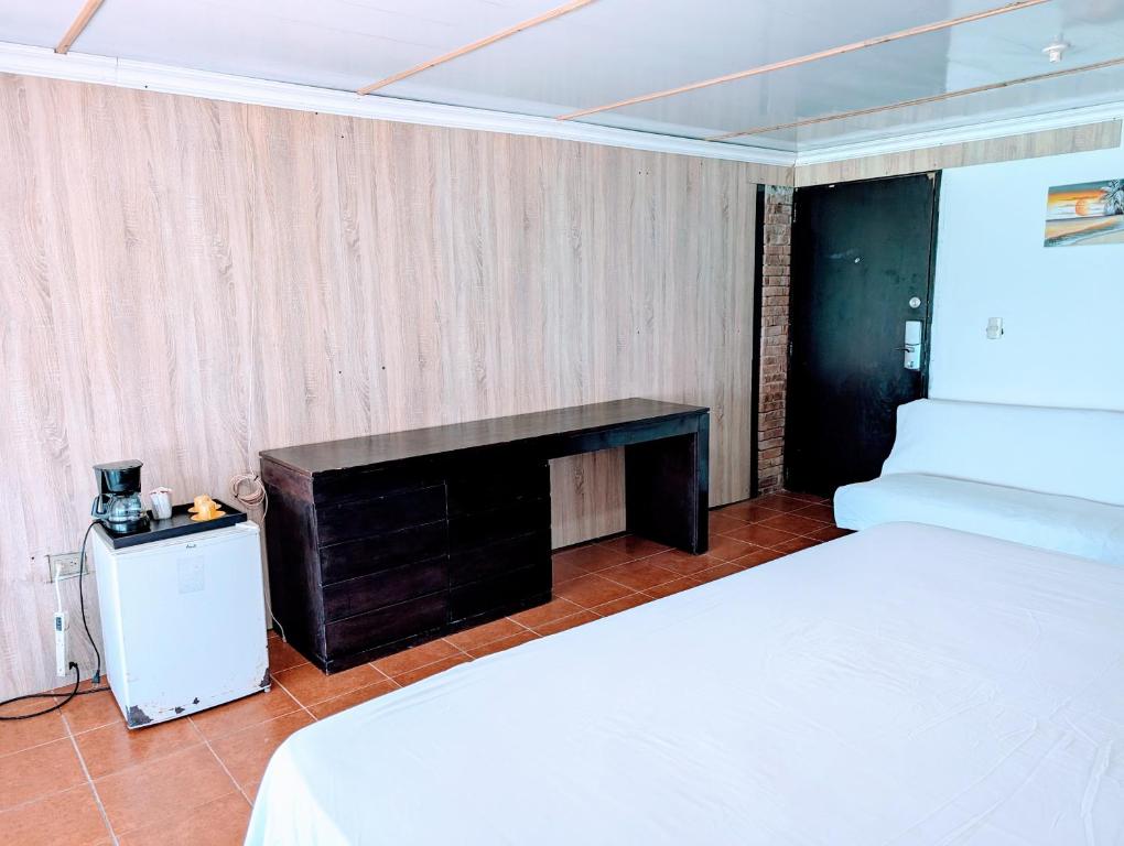 Postel nebo postele na pokoji v ubytování Dios es Fiel - Ali Hotel