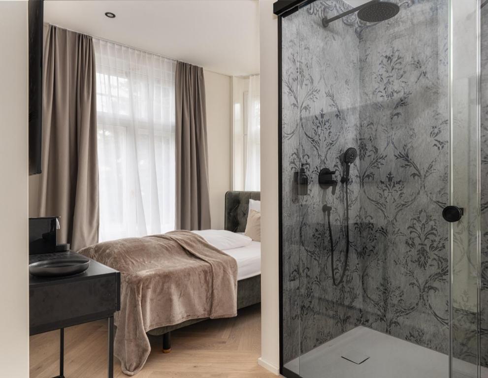 Postel nebo postele na pokoji v ubytování Boutique Hotel by Maier - contactless check-in