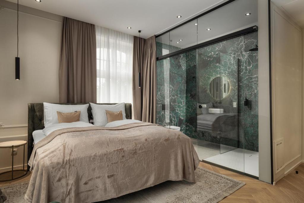 Postel nebo postele na pokoji v ubytování Boutique Hotel by Maier - contactless check-in