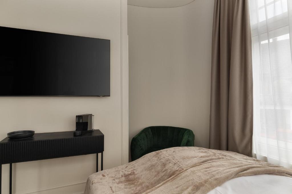TV a/nebo společenská místnost v ubytování Boutique Hotel by Maier - contactless check-in