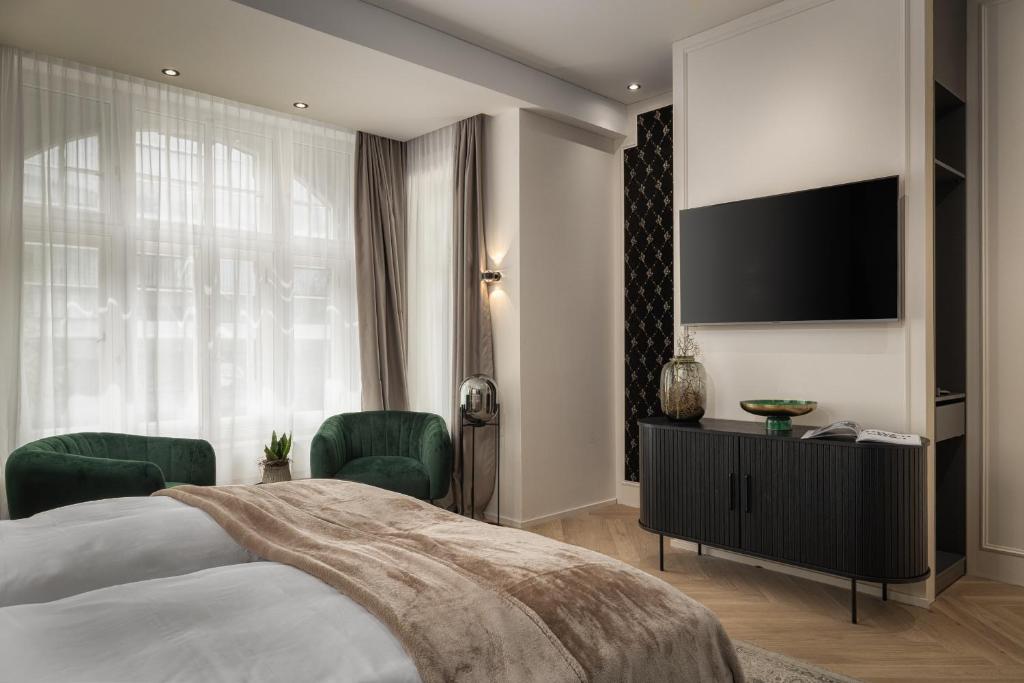 Postel nebo postele na pokoji v ubytování Boutique Hotel by Maier - contactless check-in