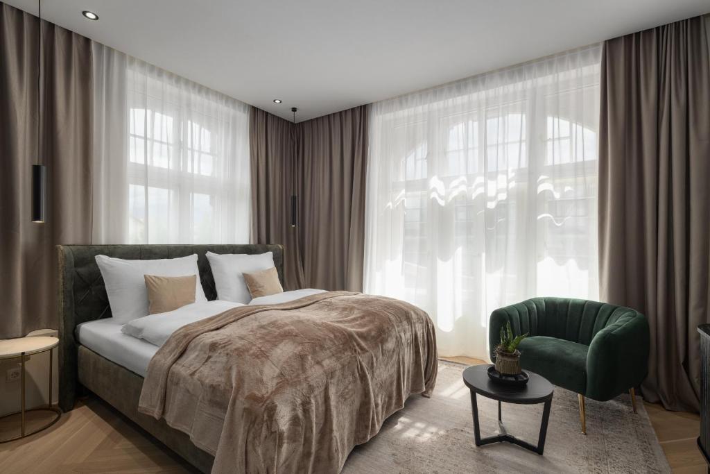 Postel nebo postele na pokoji v ubytování Boutique Hotel by Maier - contactless check-in