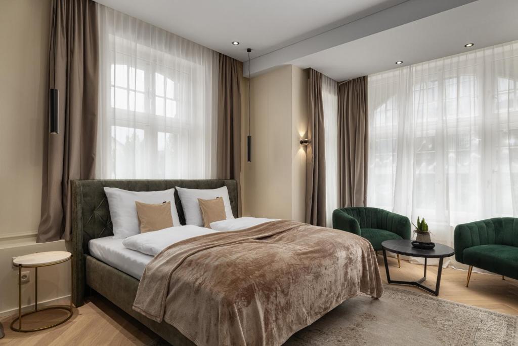 Postel nebo postele na pokoji v ubytování Boutique Hotel by Maier - contactless check-in