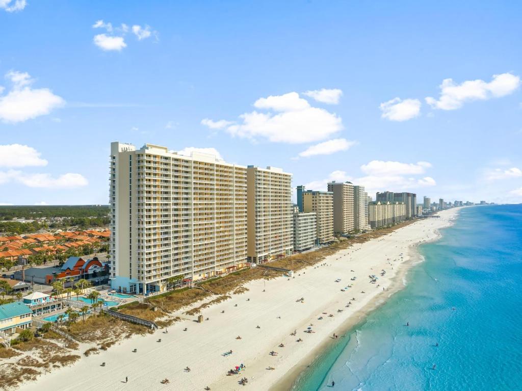 an aerial view of a beach with buildings and the ocean at Majestic Beach Resort Tower I by Panhandle Getaways in Panama City Beach