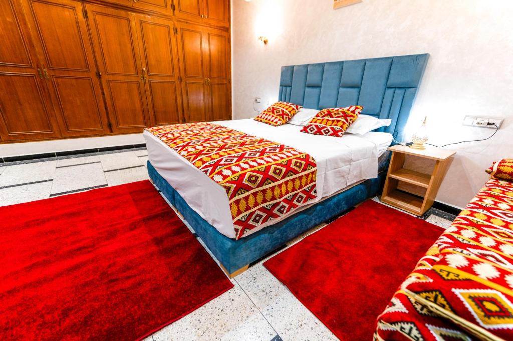 Postel nebo postele na pokoji v ubytování Riad Les Champs De Fès