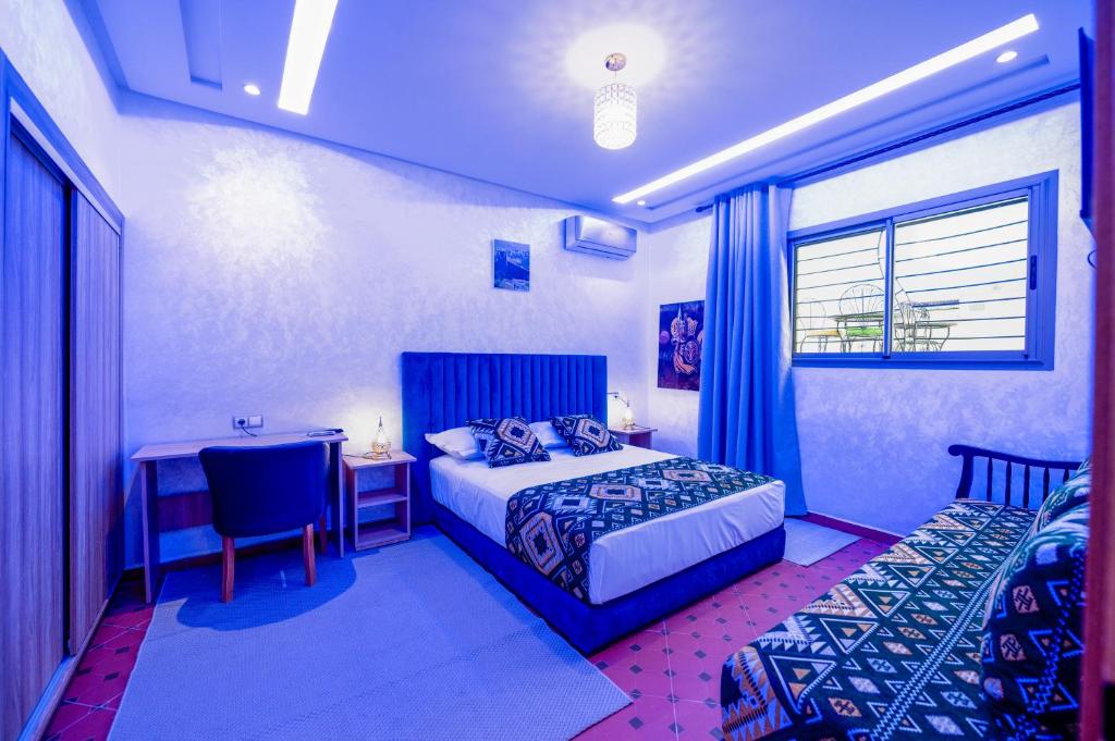 Postel nebo postele na pokoji v ubytování Riad Les Champs De Fès