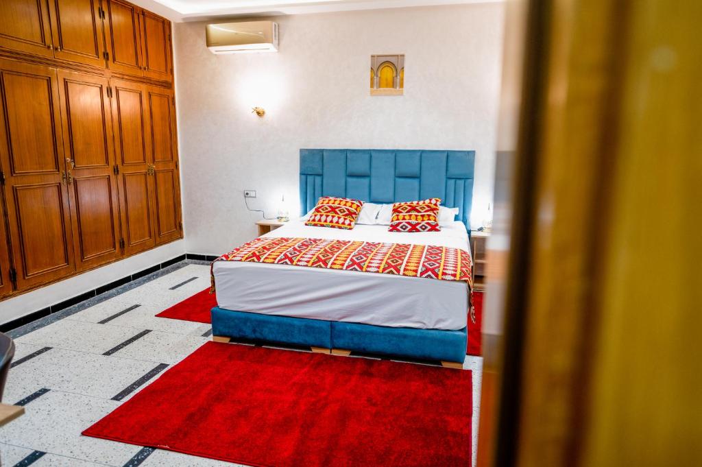 Postel nebo postele na pokoji v ubytování Riad Les Champs De Fès