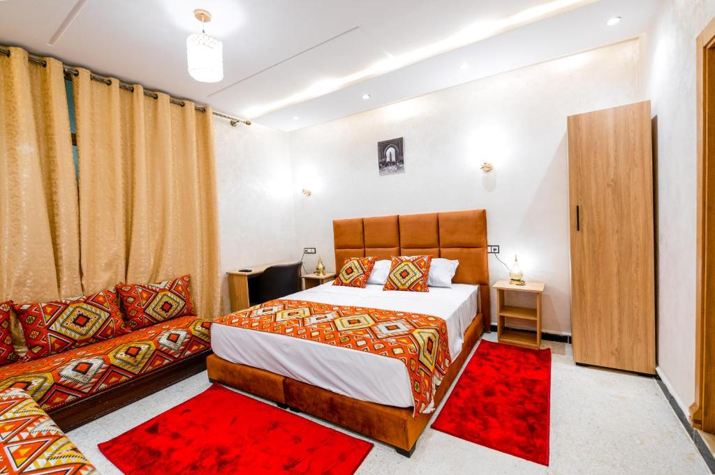 Postel nebo postele na pokoji v ubytování Riad Les Champs De Fès