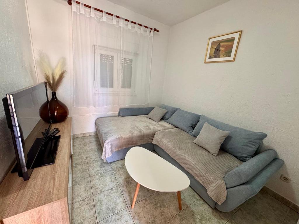 Telewizja i/lub zestaw kina domowego w obiekcie Apartments Fortuna