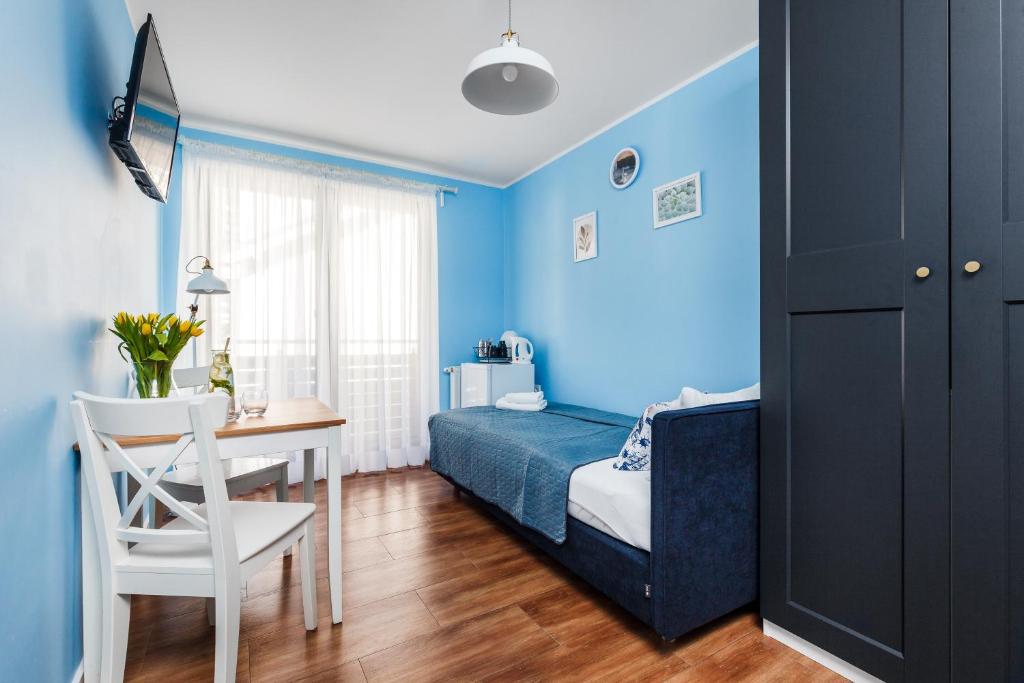 Postel nebo postele na pokoji v ubytování Papaj Resort