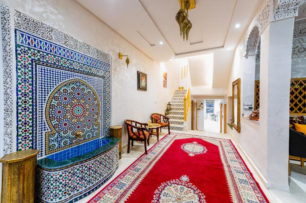 Posezení v ubytování Riad Les Champs De Fès