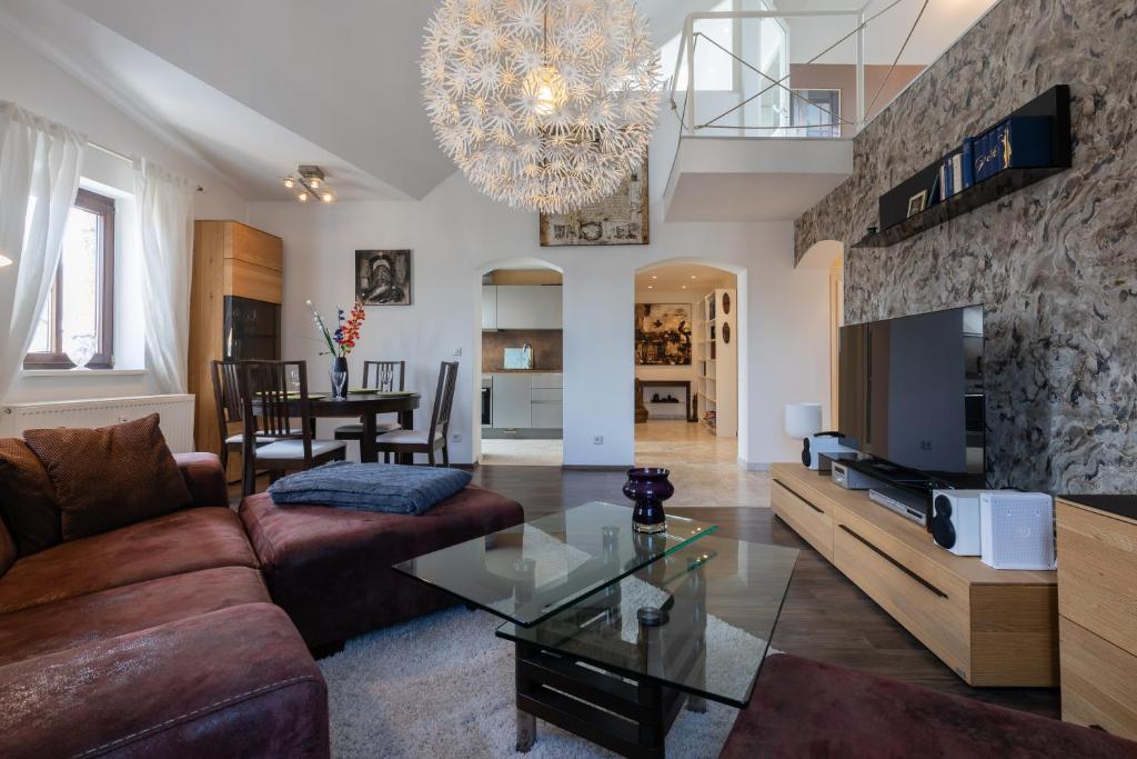 Μια τηλεόραση ή/και κέντρο ψυχαγωγίας στο Macabu Premium Apartment Joker,Chemnitz