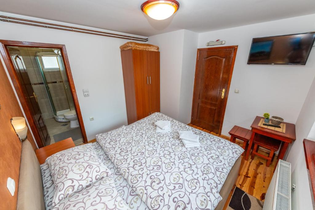 Postel nebo postele na pokoji v ubytování Rooms Sejo