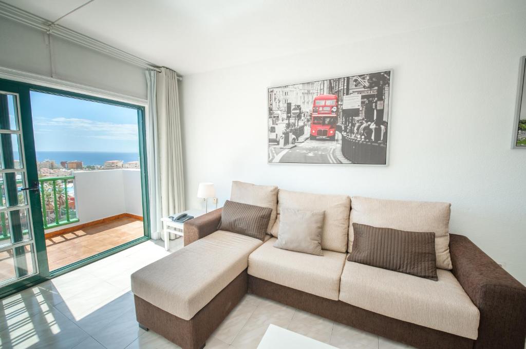 A seating area at Aparthotel Neptuno Costadeje