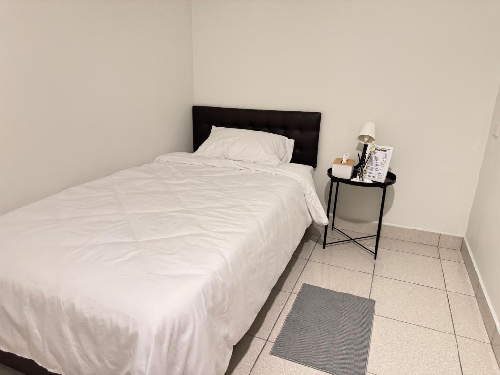 เตียงในห้องที่ Daisy house pattaya