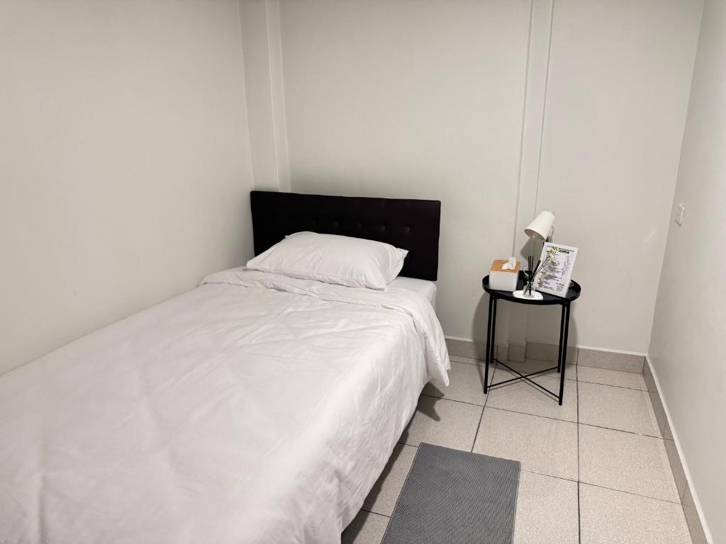 เตียงในห้องที่ Daisy house pattaya