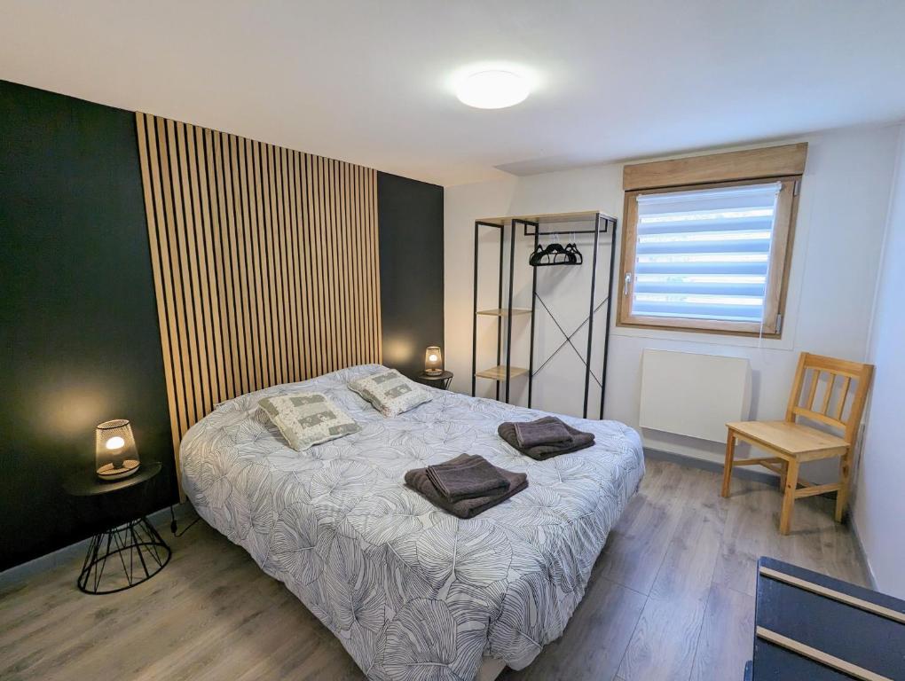 Posteľ alebo postele v izbe v ubytovaní Charmant appartement à Gérardmer