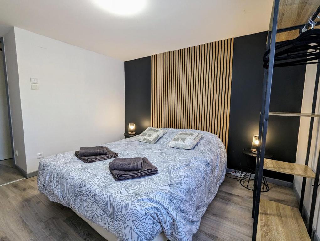 Posteľ alebo postele v izbe v ubytovaní Charmant appartement à Gérardmer