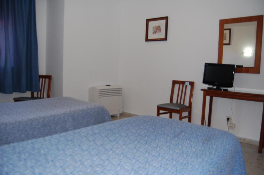 Telewizja i/lub zestaw kina domowego w obiekcie Hotel Marina Victoria