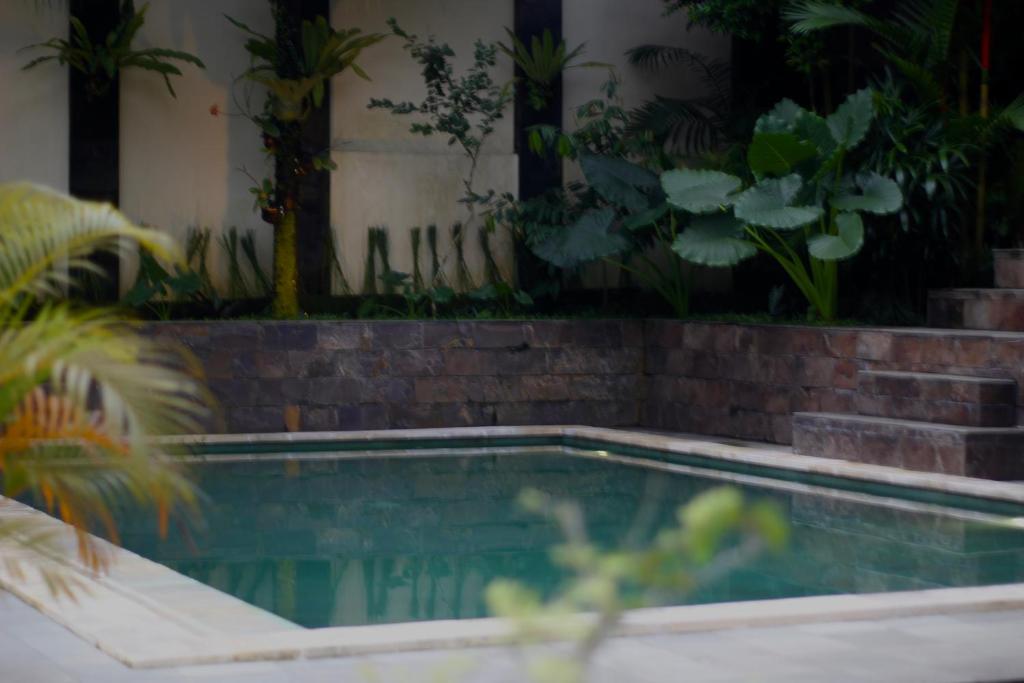 Bazén v ubytování Hanaka Riverside Ubud nebo v jeho okolí