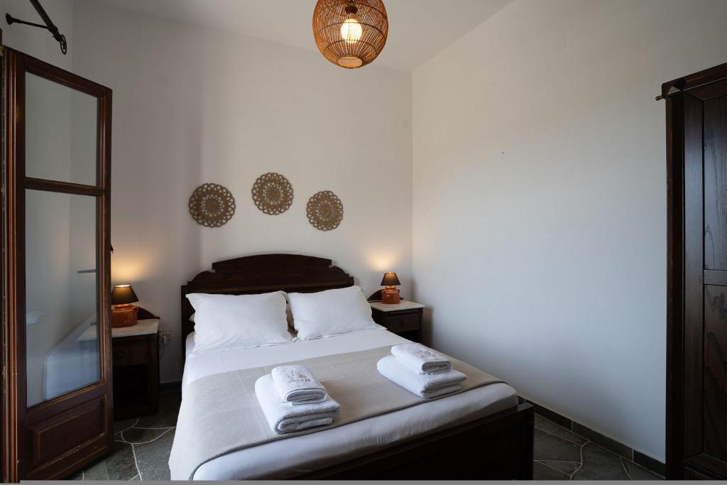 Postel nebo postele na pokoji v ubytování Mirsini Apartments in Sifnos