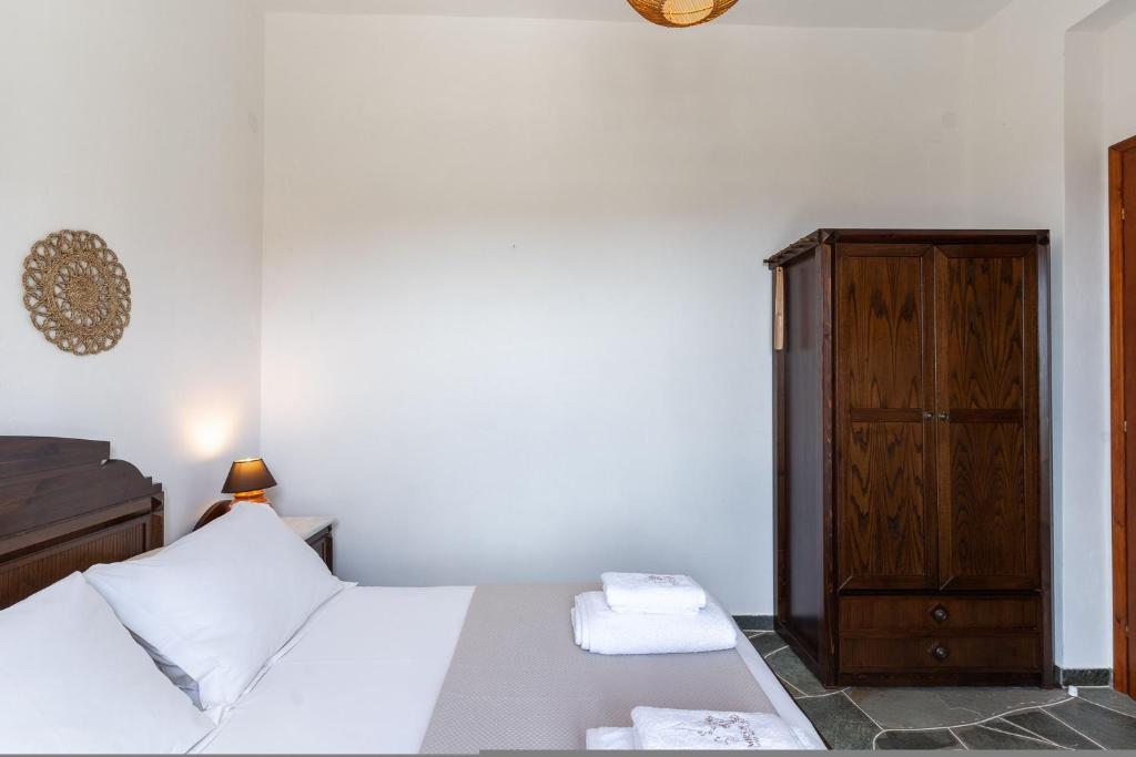 Postel nebo postele na pokoji v ubytování Mirsini Apartments in Sifnos