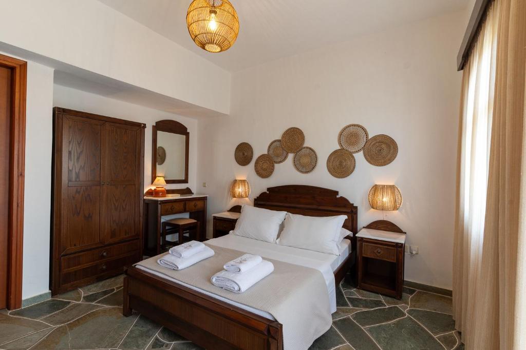 Postel nebo postele na pokoji v ubytování Mirsini Apartments in Sifnos