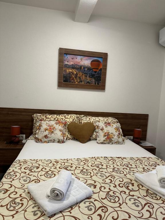 Postel nebo postele na pokoji v ubytování AS apartmani
