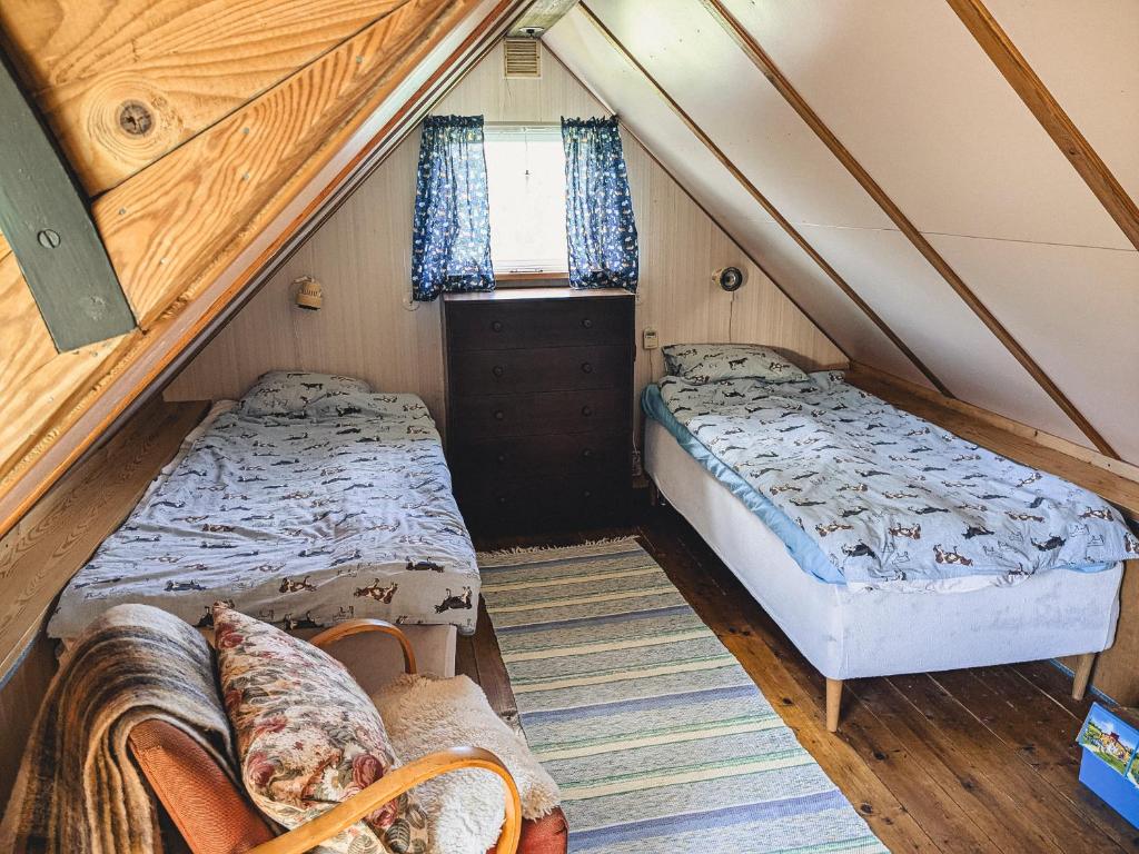 Postel nebo postele na pokoji v ubytování Torp Vimsa