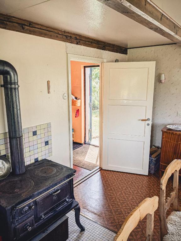 Kuchyň nebo kuchyňský kout v ubytování Torp Vimsa