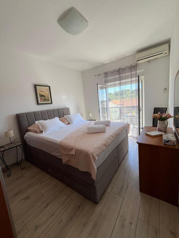 Posteľ alebo postele v izbe v ubytovaní Apartment Božo
