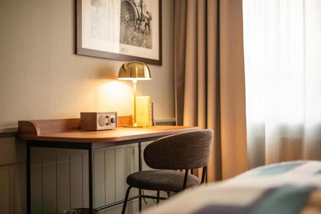 Postel nebo postele na pokoji v ubytování Home Hotel Bolinder Munktell