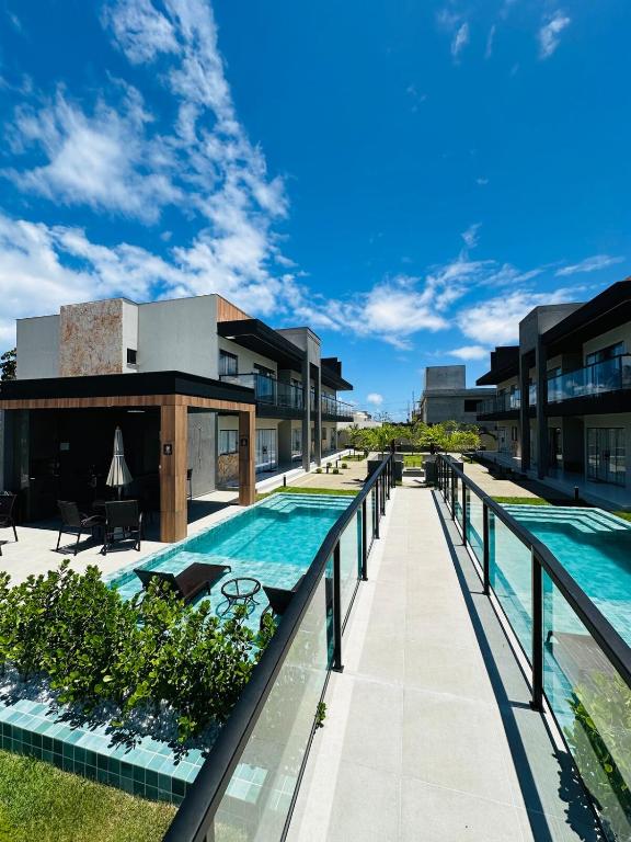 an image of a swimming pool on a building at Casa da Alê in Camaçari