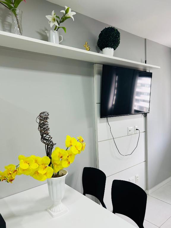 TV a/nebo společenská místnost v ubytování Time Maceió Mar