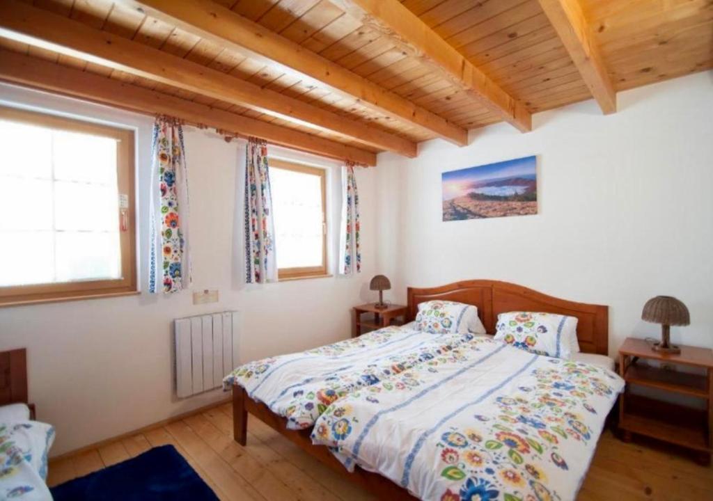 Postel nebo postele na pokoji v ubytování Tatralandia apartment