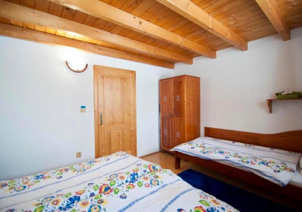 Postel nebo postele na pokoji v ubytování Tatralandia apartment