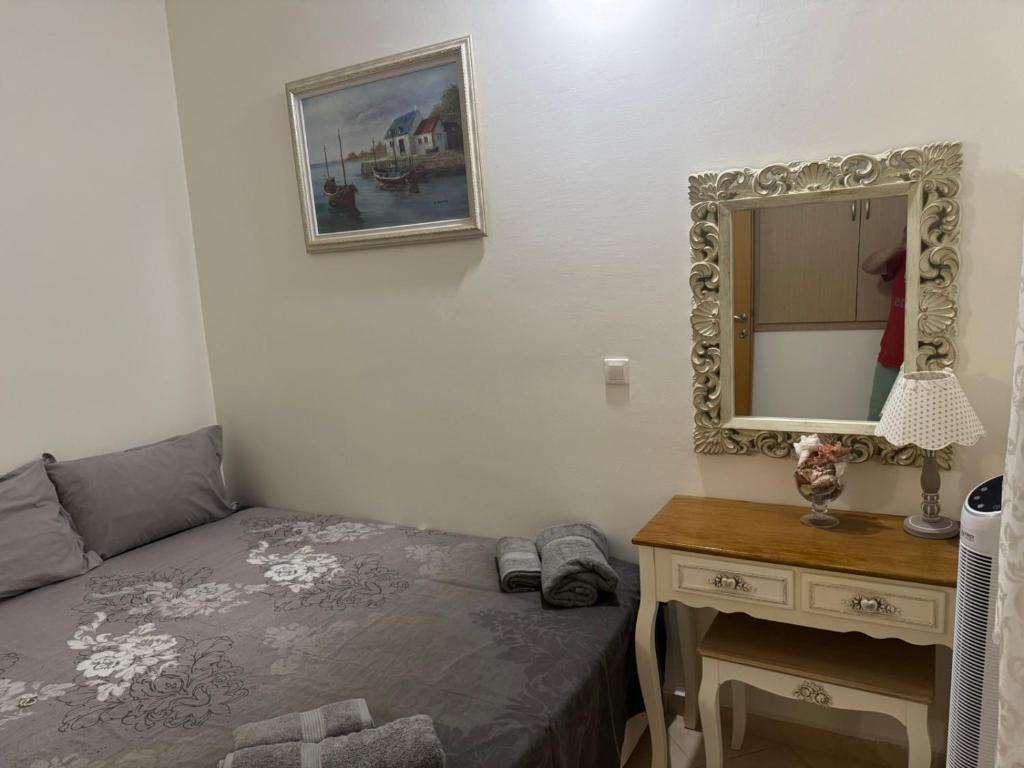 Postel nebo postele na pokoji v ubytování Raya Apartments Siviri Garden
