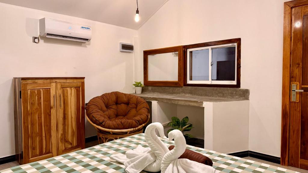 Postel nebo postele na pokoji v ubytování Arcadia villas Arugambay