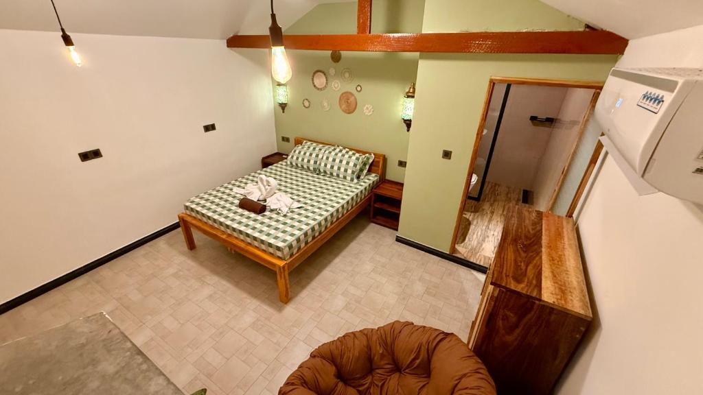 Postel nebo postele na pokoji v ubytování Arcadia villas Arugambay