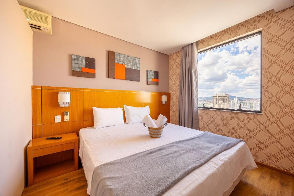 Postel nebo postele na pokoji v ubytování Flats New Osasco Trade Center