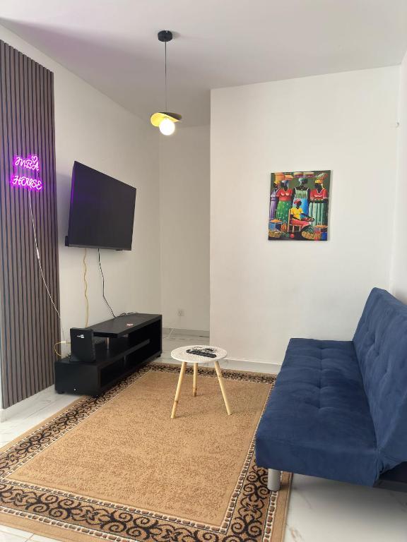 TV a/nebo společenská místnost v ubytování MBA house