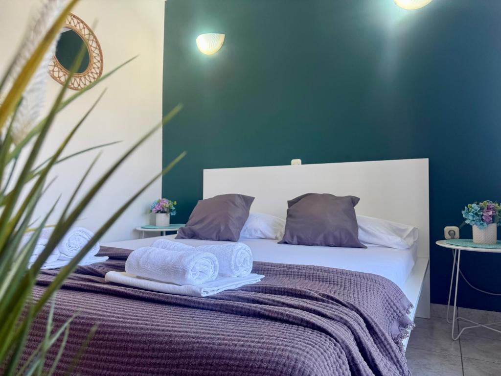 Postel nebo postele na pokoji v ubytování Apartments Ana & Ita