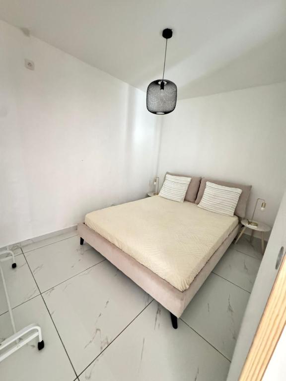 Postel nebo postele na pokoji v ubytování MBA house